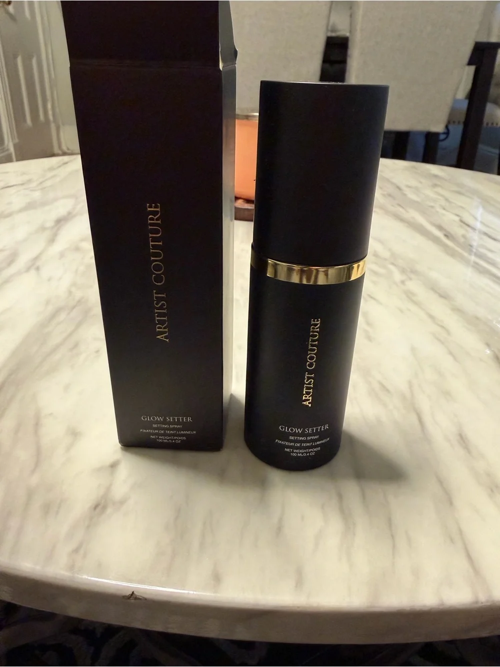 Artist Couture Glow Setter Setting Spray in Black & Gold Text